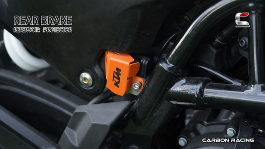 Carbon Racing-Aluminium Rear Brake Reservoir Protector (Orange) For KTM Adventure 390250X (2025)