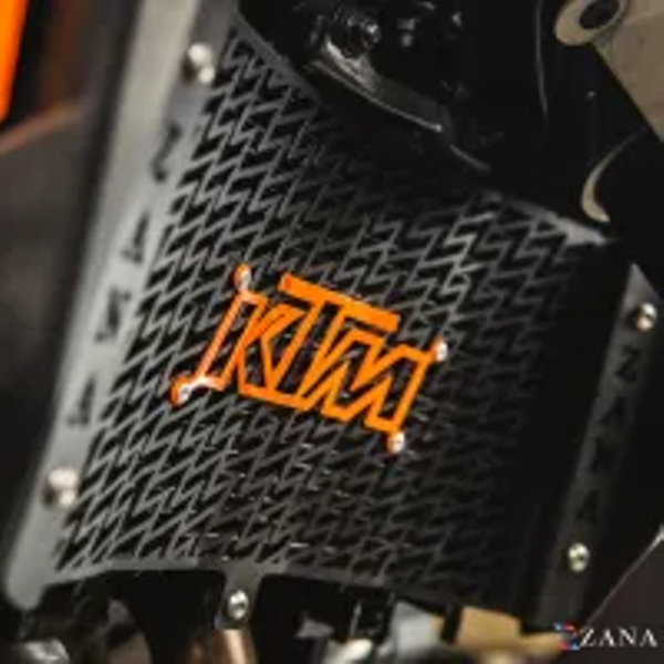 ZANA Radiator Guard with KTM Logo Orange For KTM Adv 390 2025 (Black SS 304 )-ZI-8583
