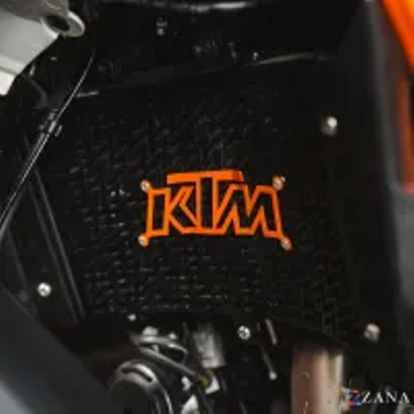 ZANA Radiator Guard with KTM Logo Orange For KTM Adv 390 2025 (Black SS 304 )-ZI-8583