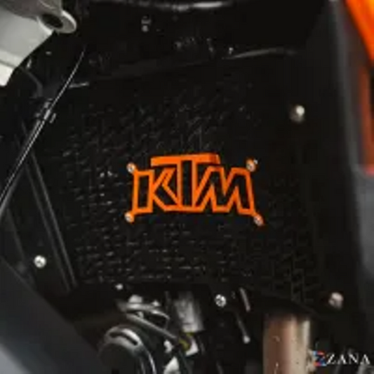 ZANA Radiator Guard with KTM Logo Orange For KTM Adv 390 2025 (Black SS 304 )-ZI-8583
